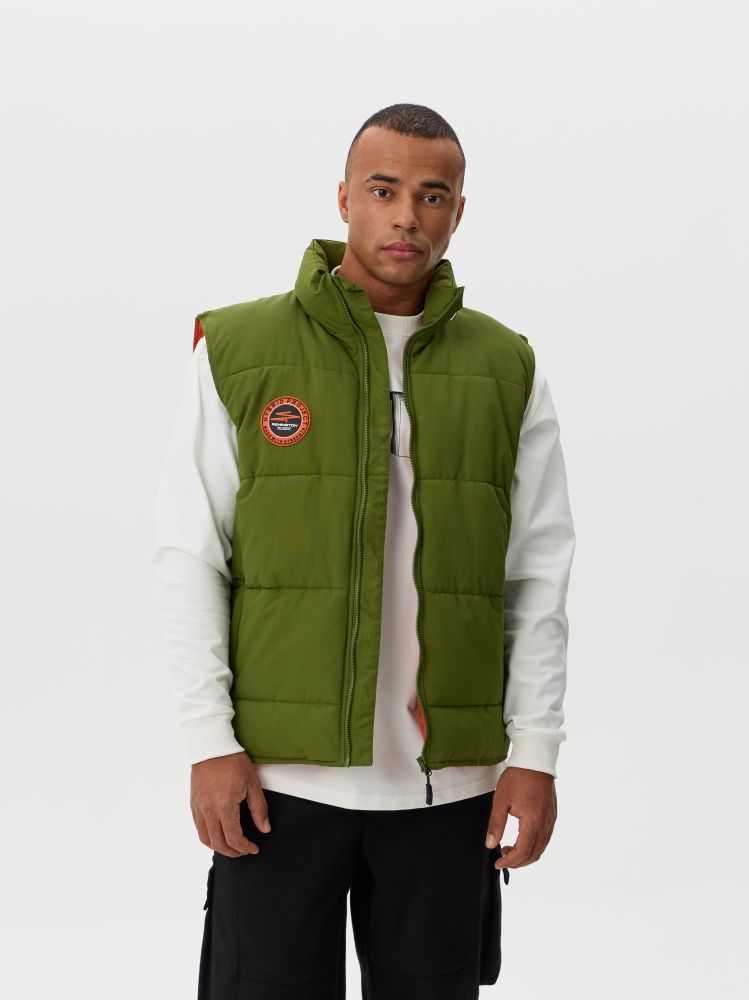 Что делает жилет Remington Eldar Green практичным выбором для межсезонья